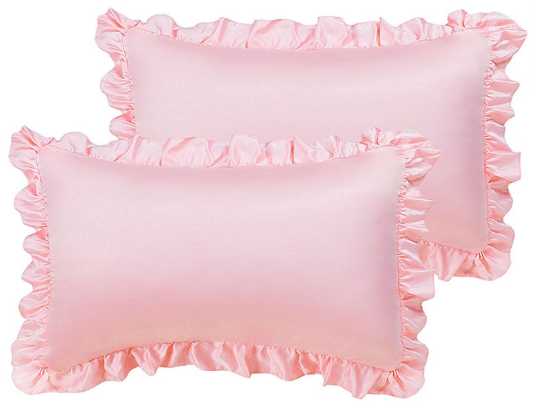 Pink ruffled pillow shams